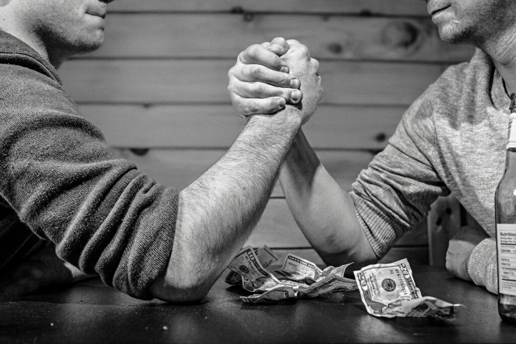 two men arm wrestling