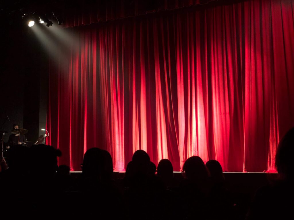 theatre stage with red curtain